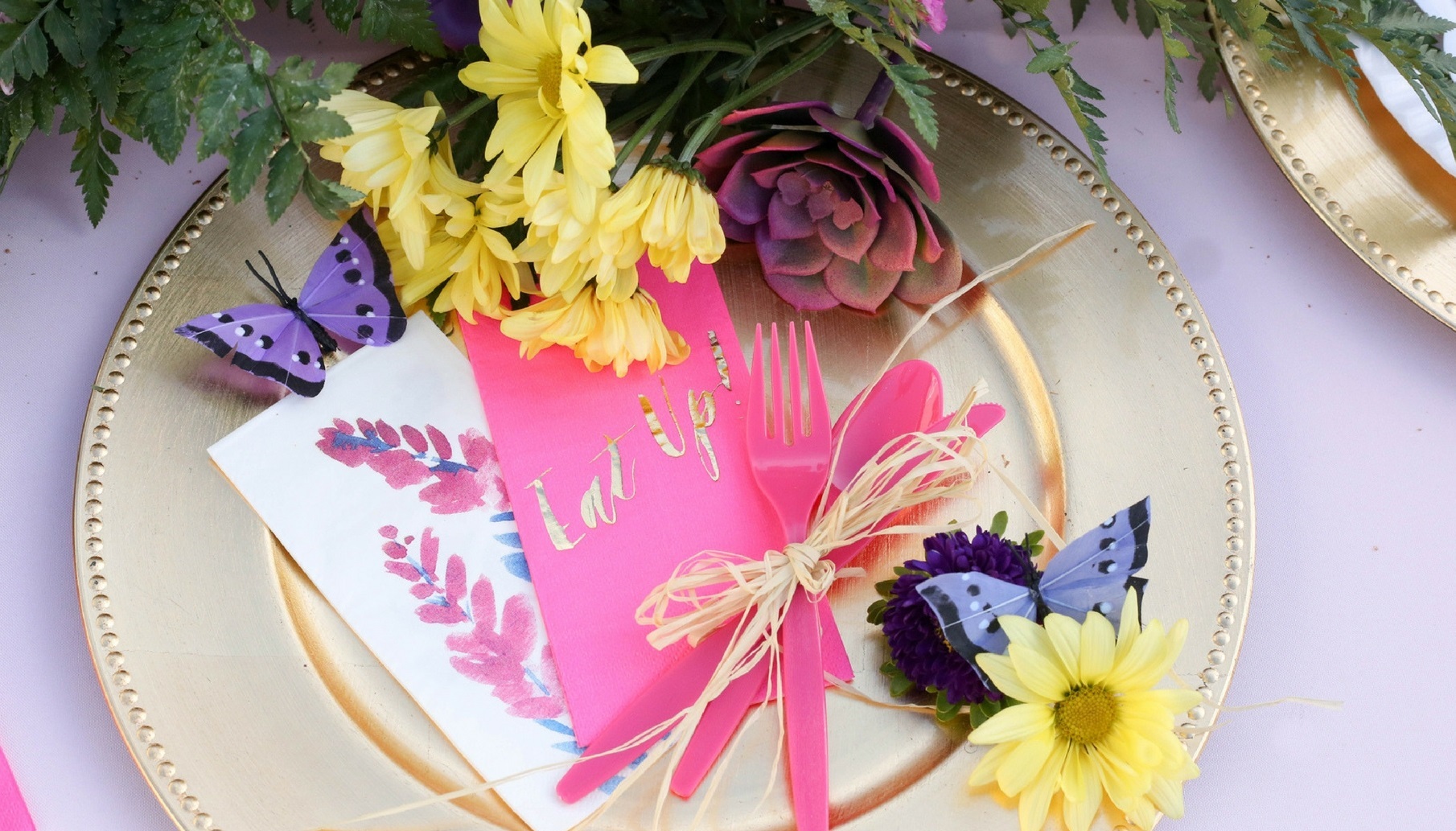 bold floral spring wedding palette with butterflies and florals