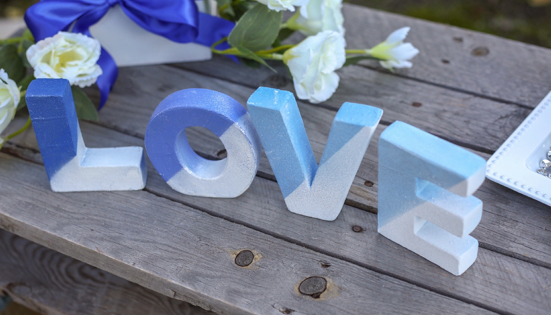 something blue painted concrete love letter sign