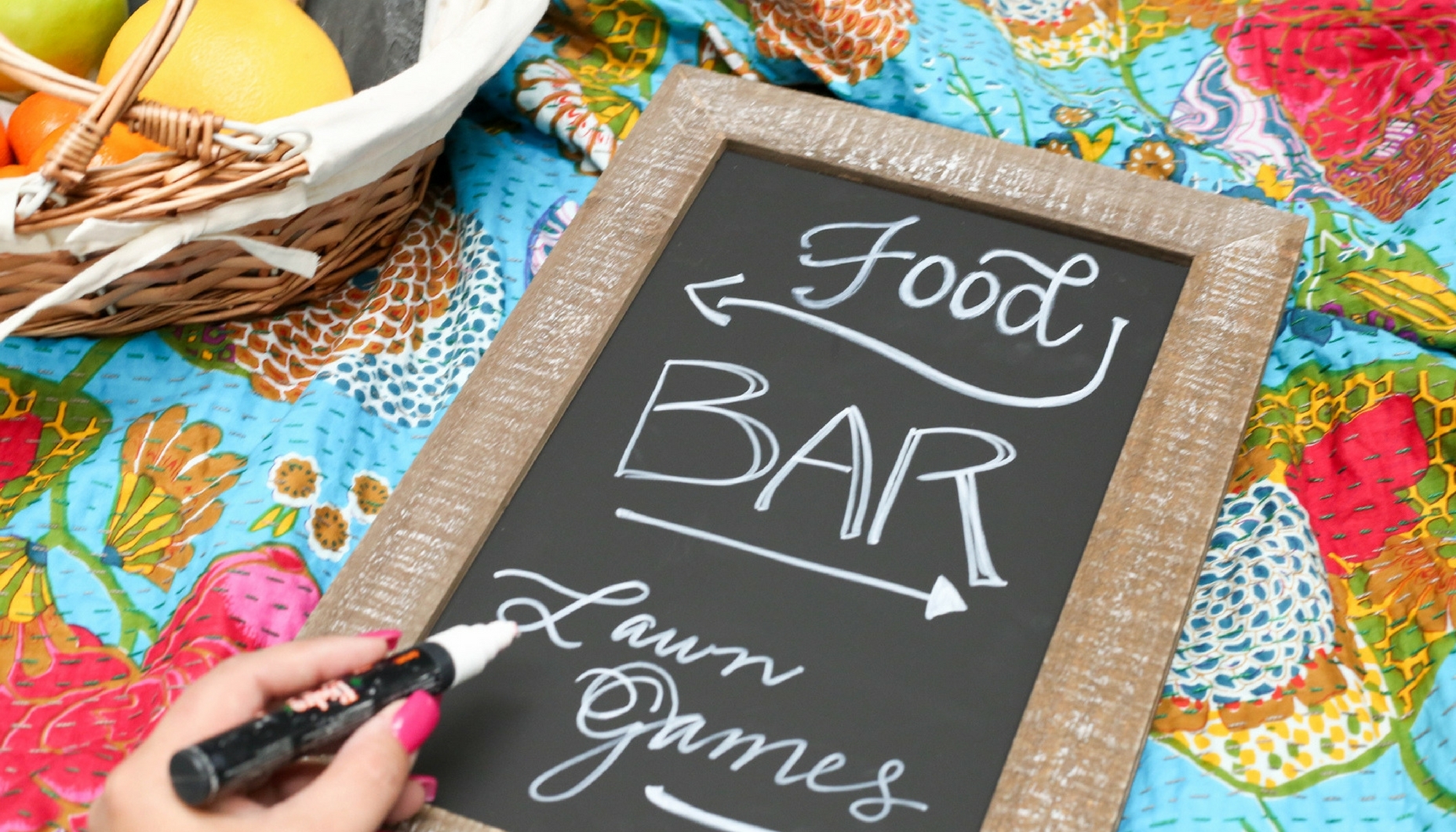 wedding lawn games sign on a distressed chalkboard
