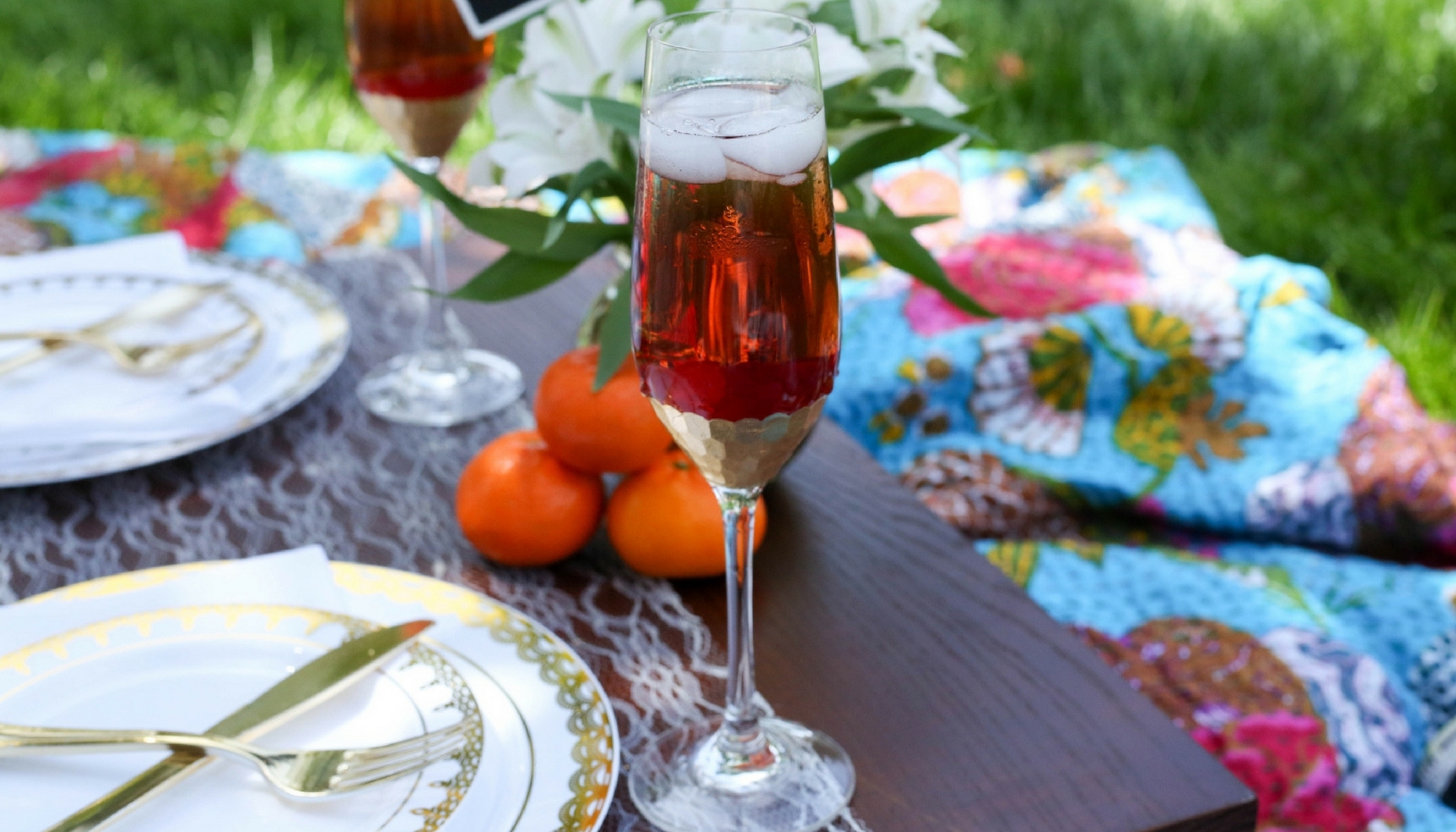 gold edged glass with orange honey paloma summer cocktail