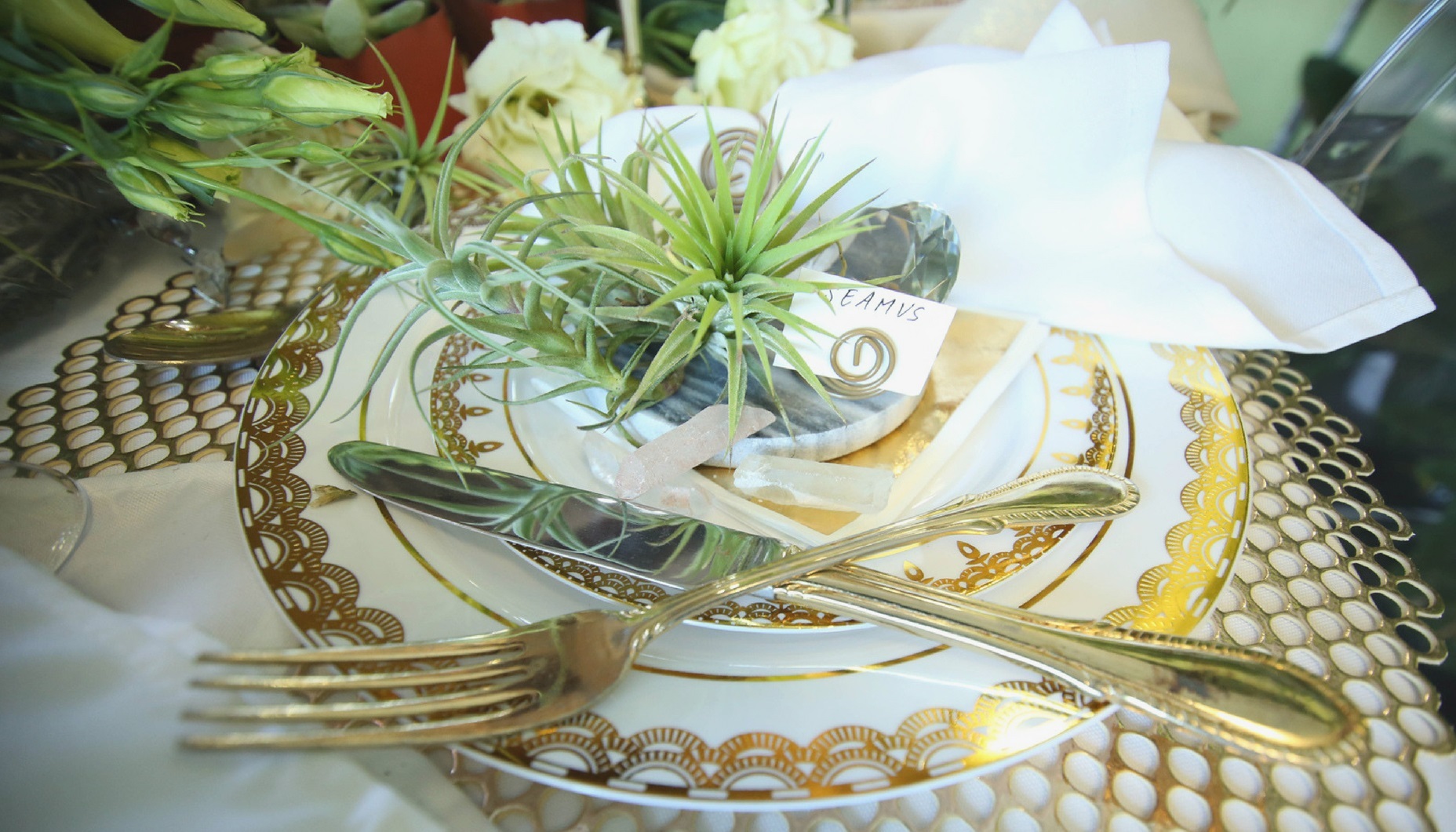 marble wedding details with gold and greenery