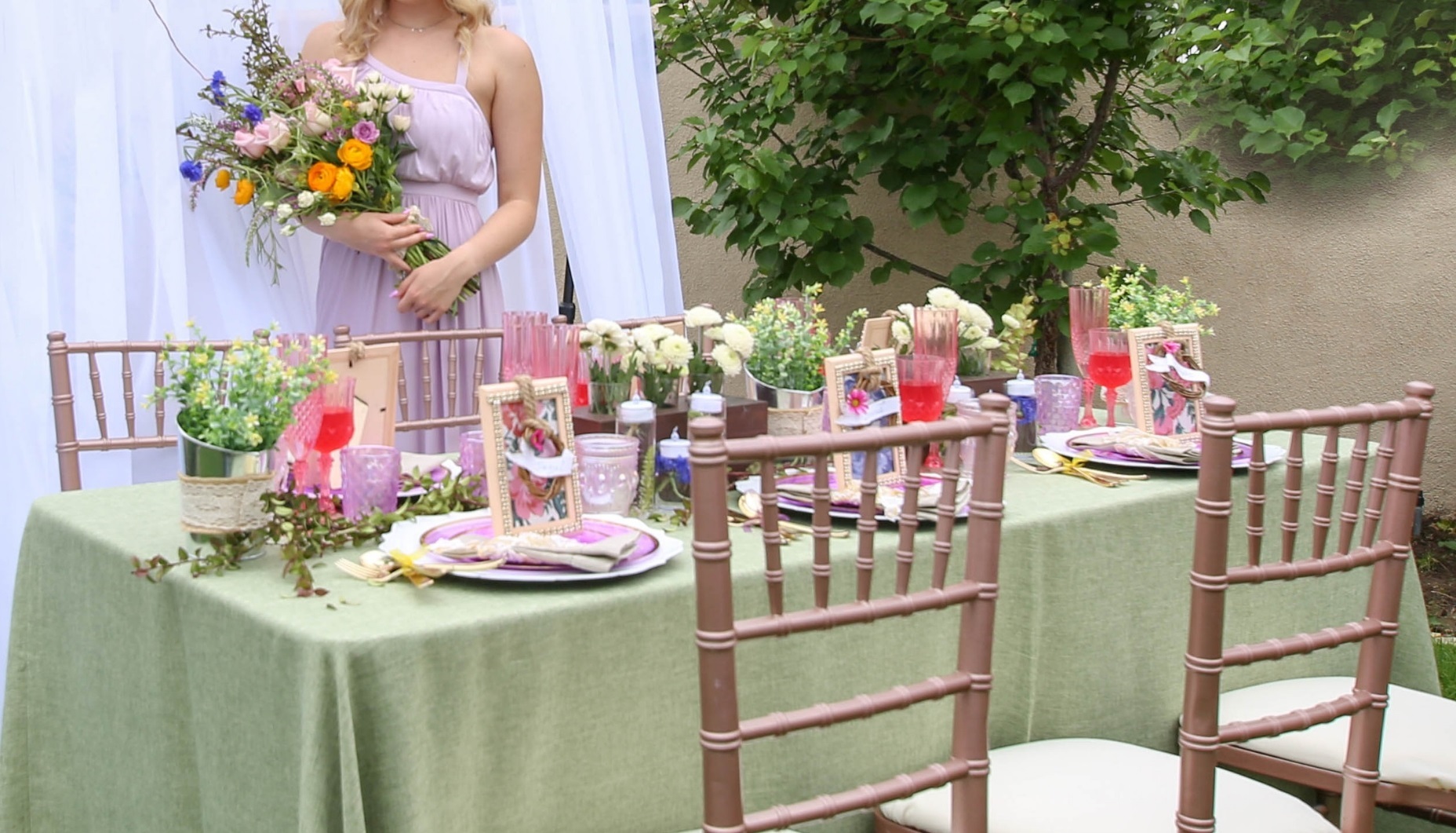 Wildflower fields wedding with iridescent glassware and dusty rose bridesmaid gowns