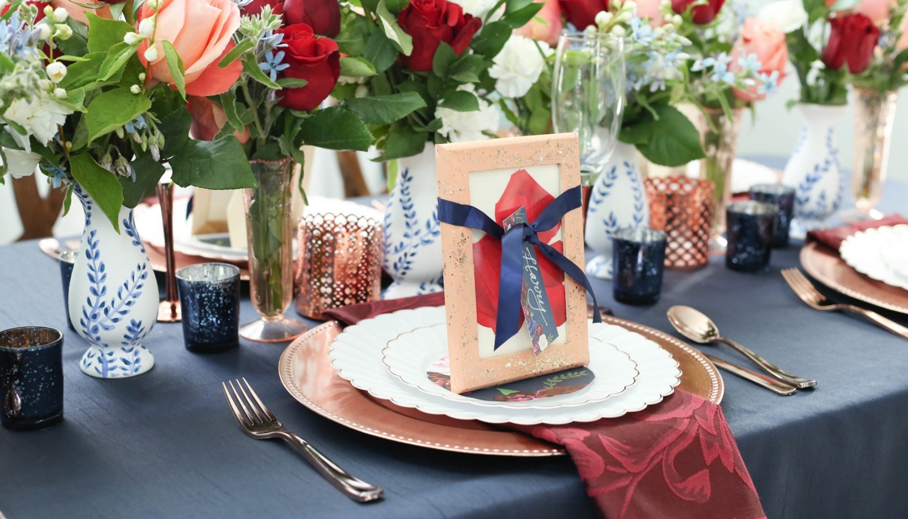 wedding place setting layout navy and marsala palette