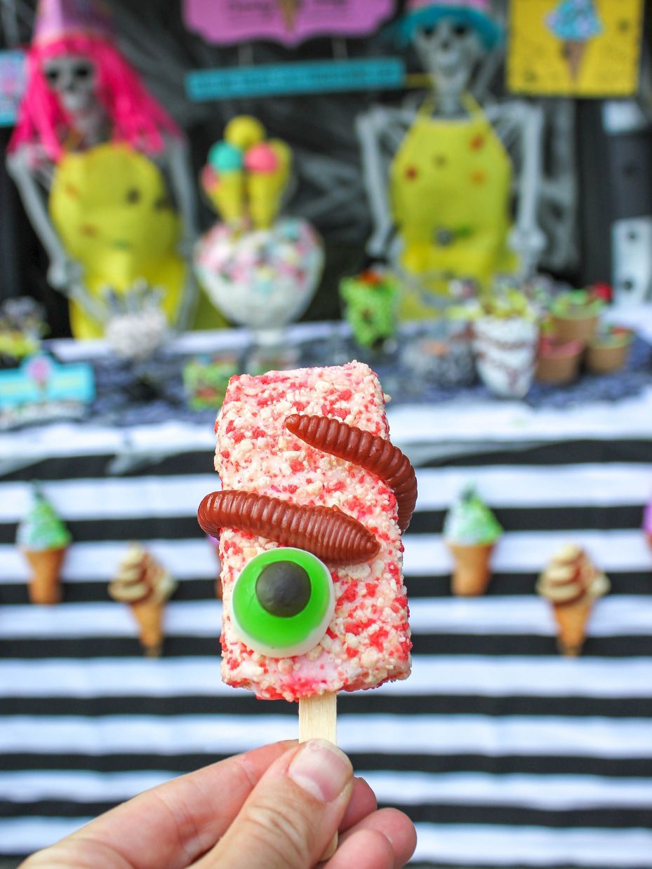 ice cream with gummy eyeball and worm candy