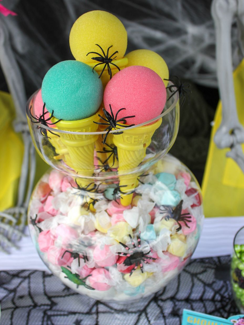 display of salt water taffy and ice cream cones with spider rings