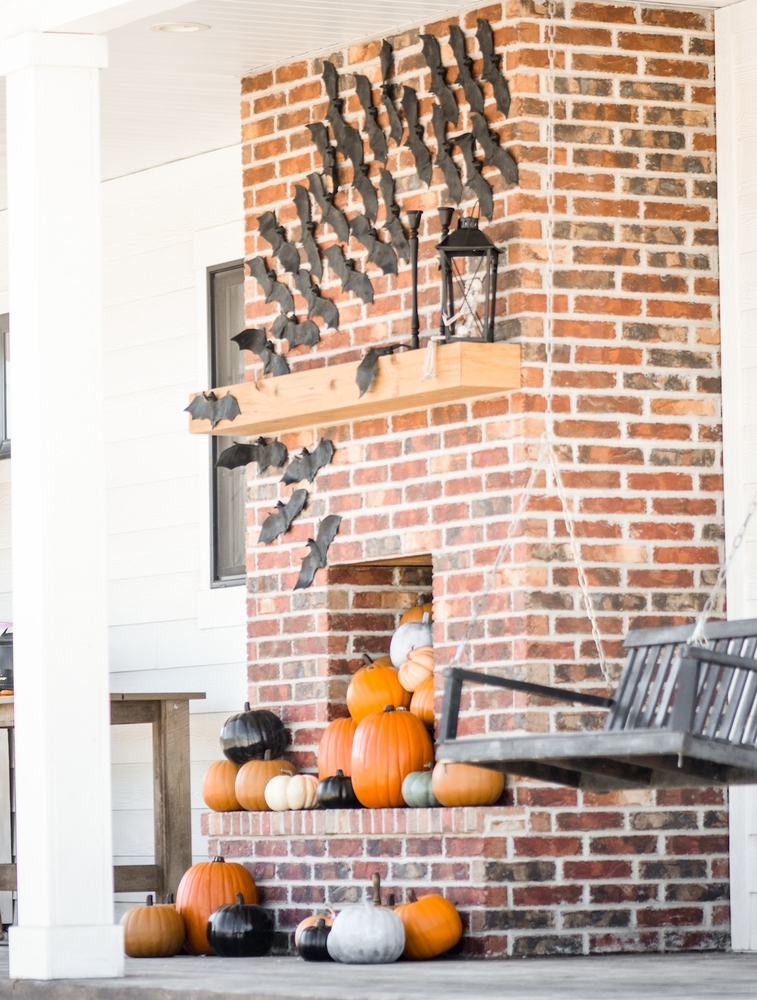 Bats Pumpkins on Fireplace Farmhouse Halloween Front Porch Decorating by Kara's Party Ideas for Oriental Trading Company