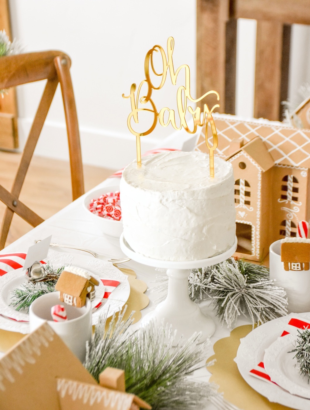 cake topper at Gingerbread house holiday Christmas baby shower table and ideas