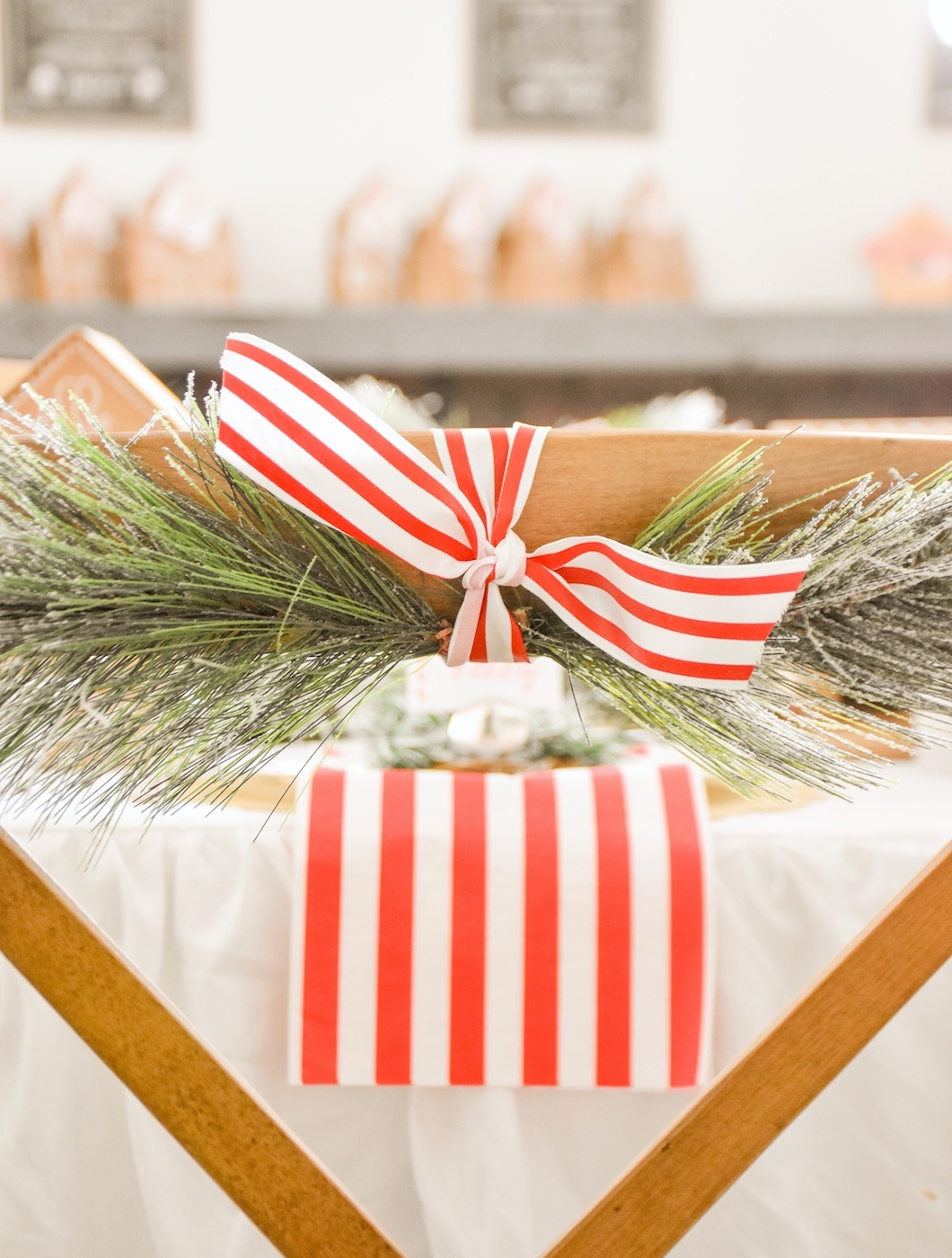 Chair garland Gingerbread House Holiday Christmas baby shower table and ideas