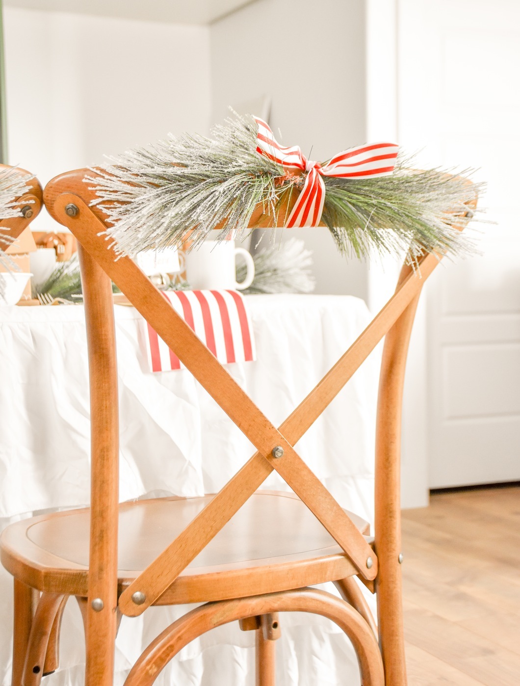 Chair garland Gingerbread House Holiday Christmas baby shower table and ideas