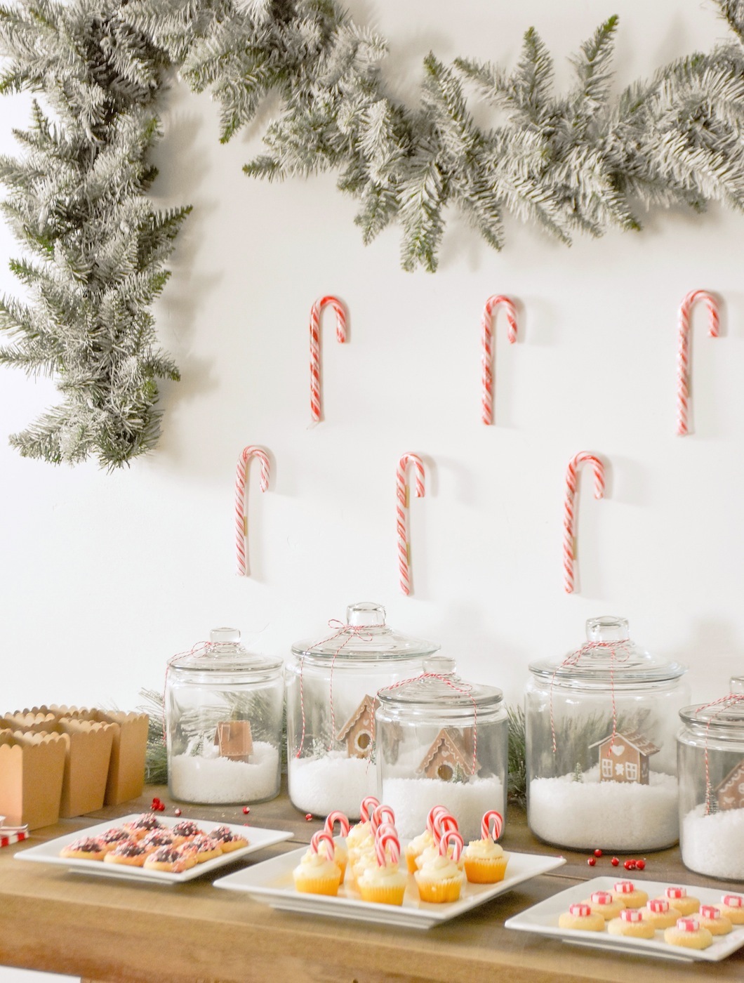 Candy Cane Cupcakes Gingerbread House Holiday Christmas baby shower table and ideas