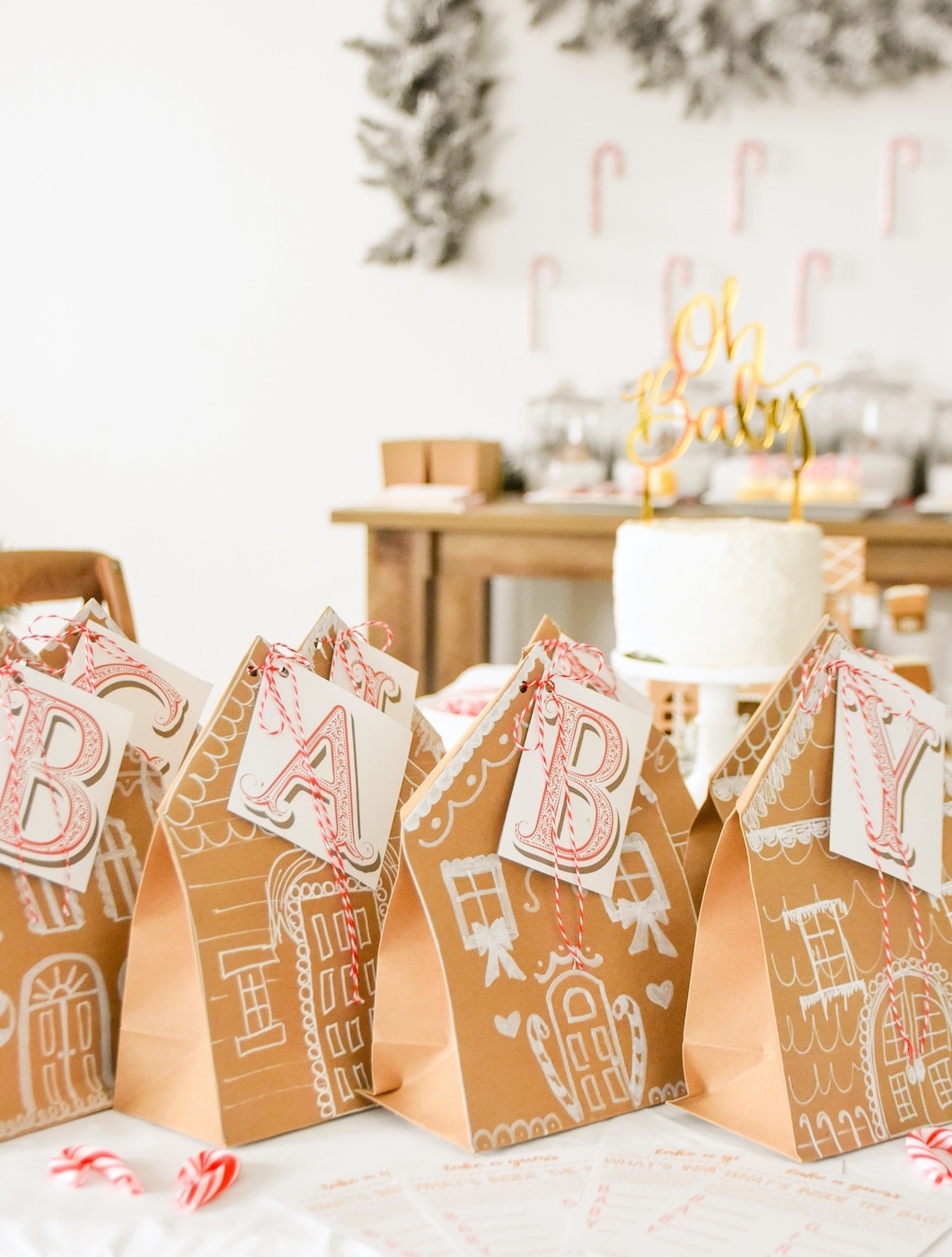Guessing Game at Gingerbread House Holiday Christmas baby shower table and ideas