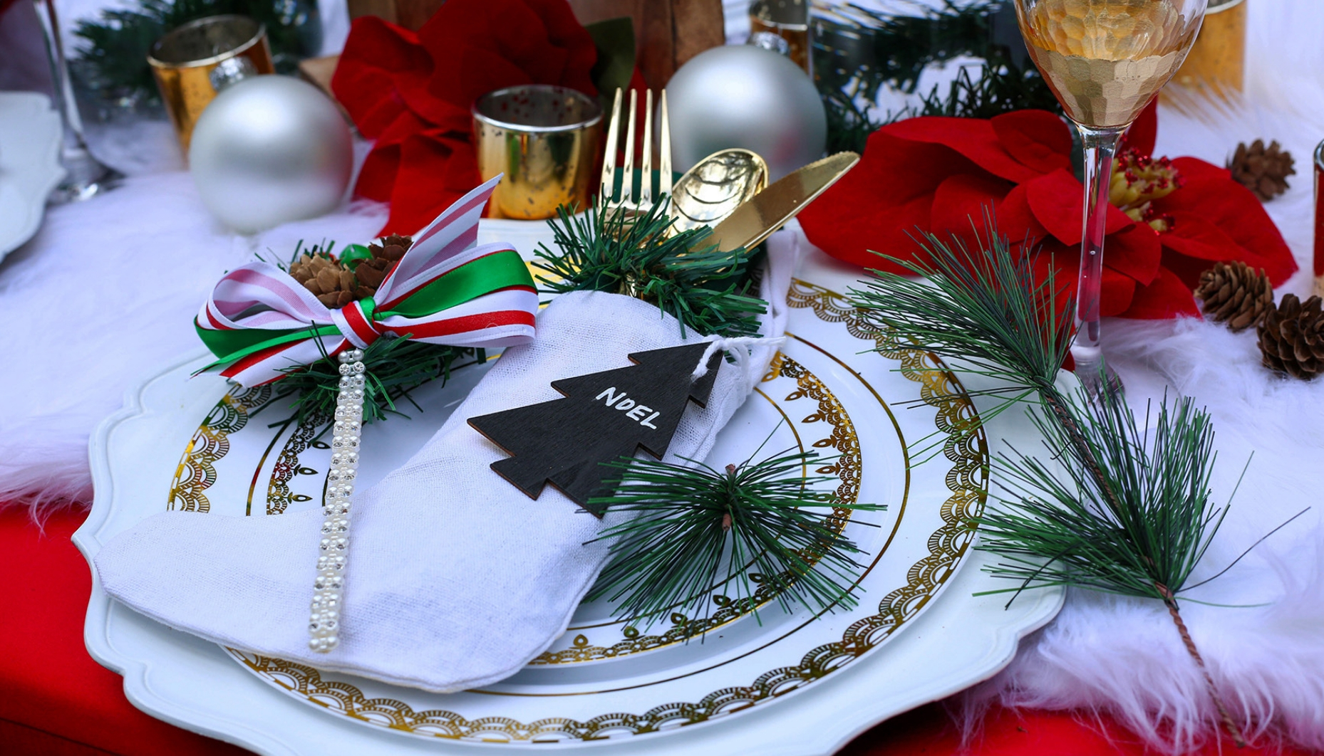 Christmas Wedding tablescape with fur runner, pine garland and cranberry centerpieces