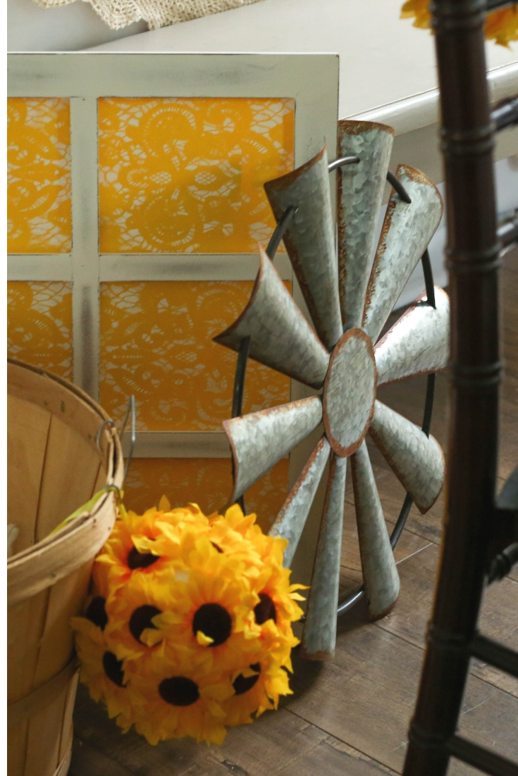 Farmhouse style props for a rustic sunflower themed wedding