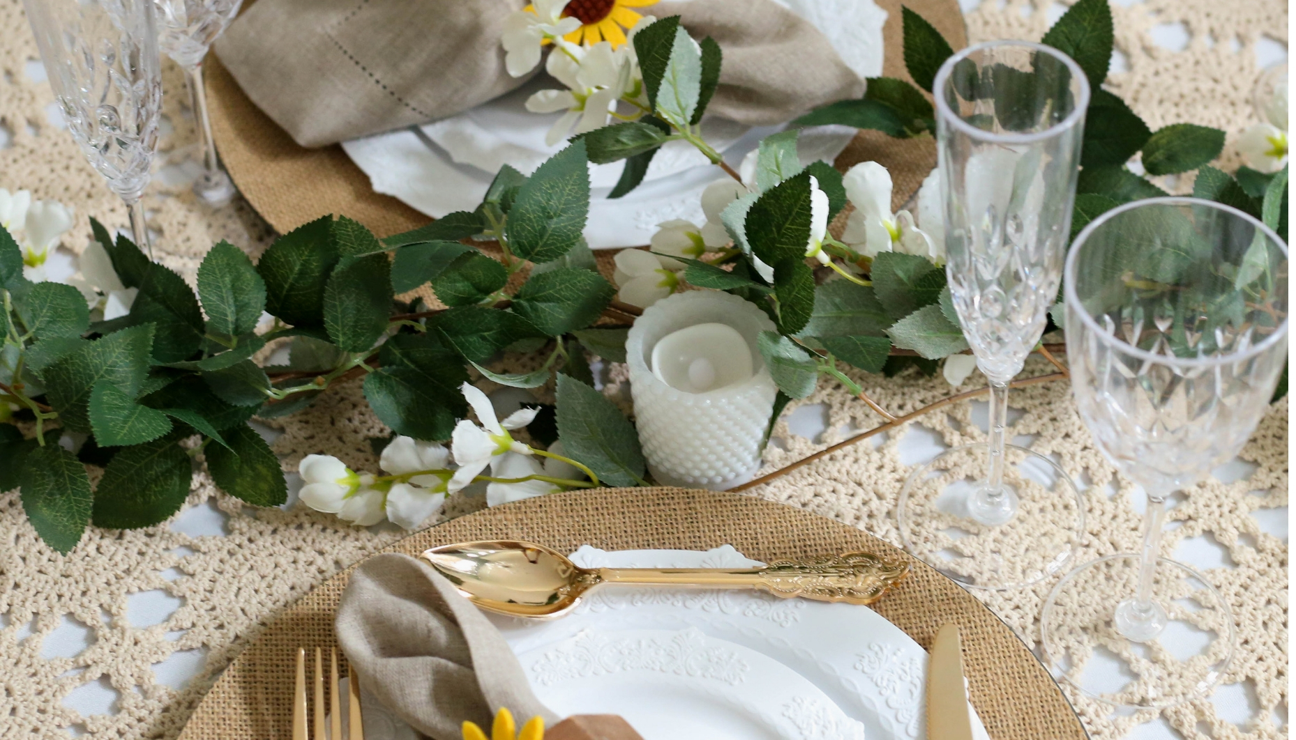 Dogwood garland and hobnail votives on a tea stained vintage crochet linen for a rustic sunflower wedding