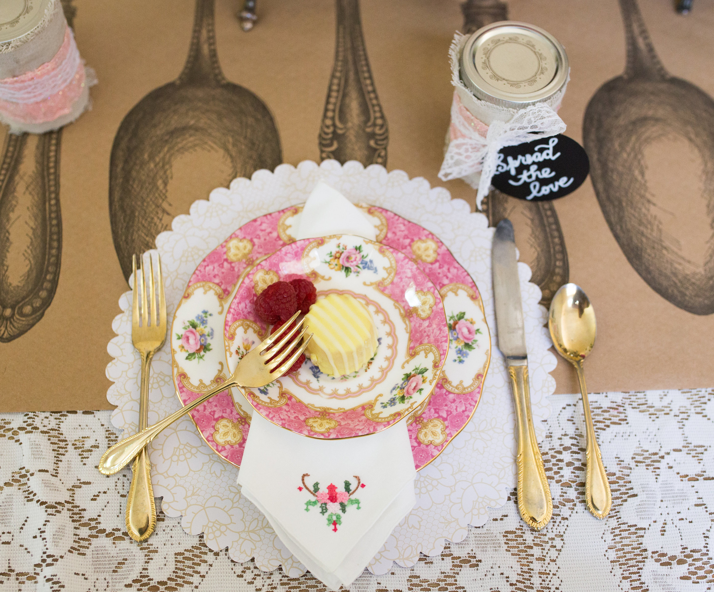 vintage romantic china place setting with gold flatware and handmade DIY favors
