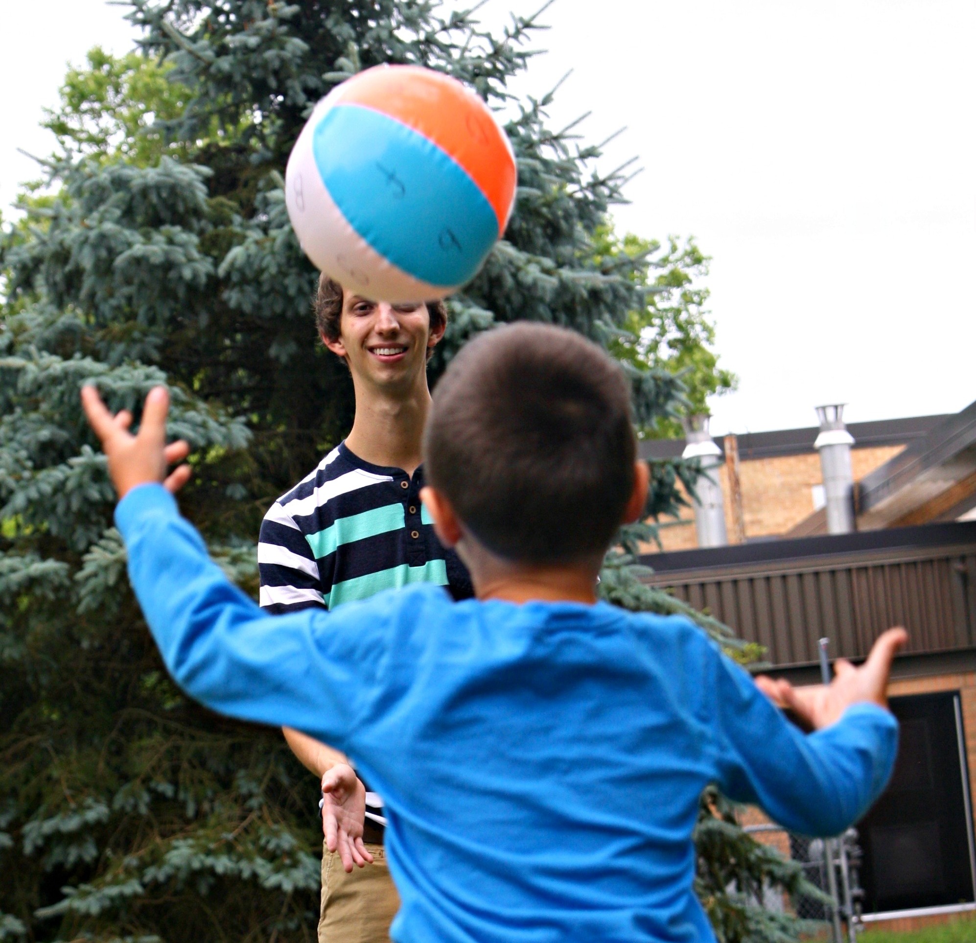 Toss the beach ball back and forth. Identify the letter that is closest to your thumb.