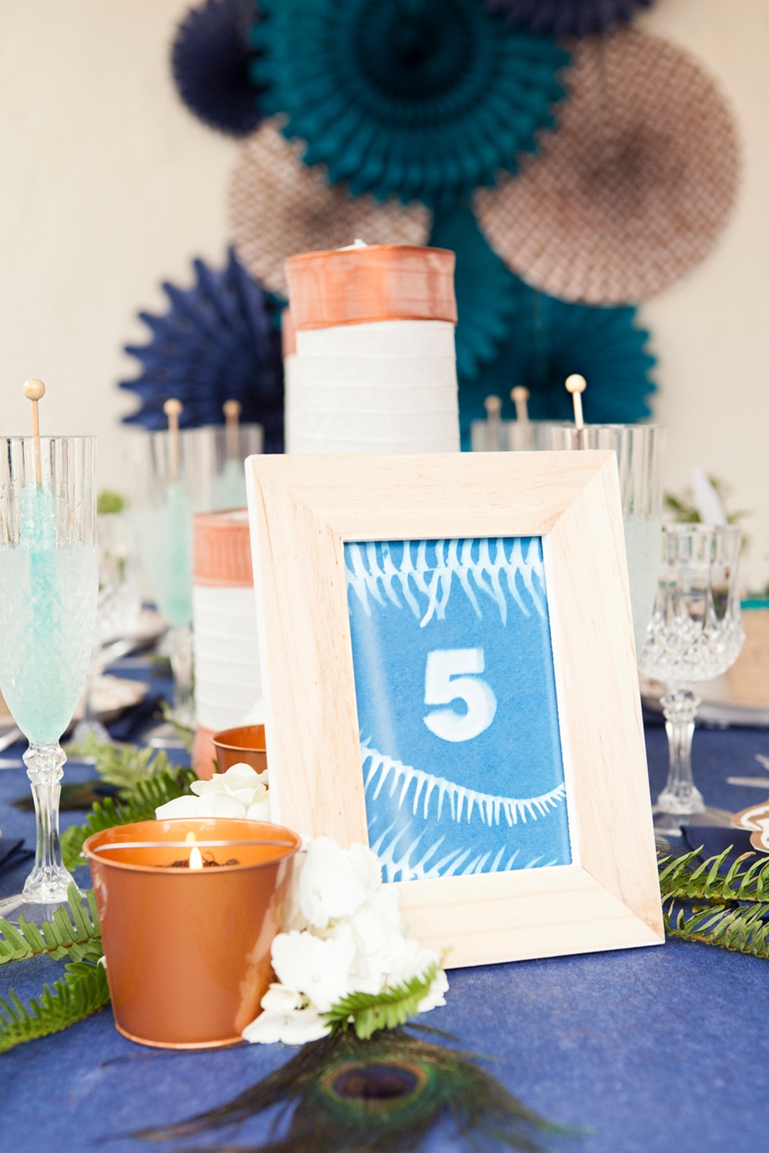 Check out this awesome DIY nature-print table number idea!