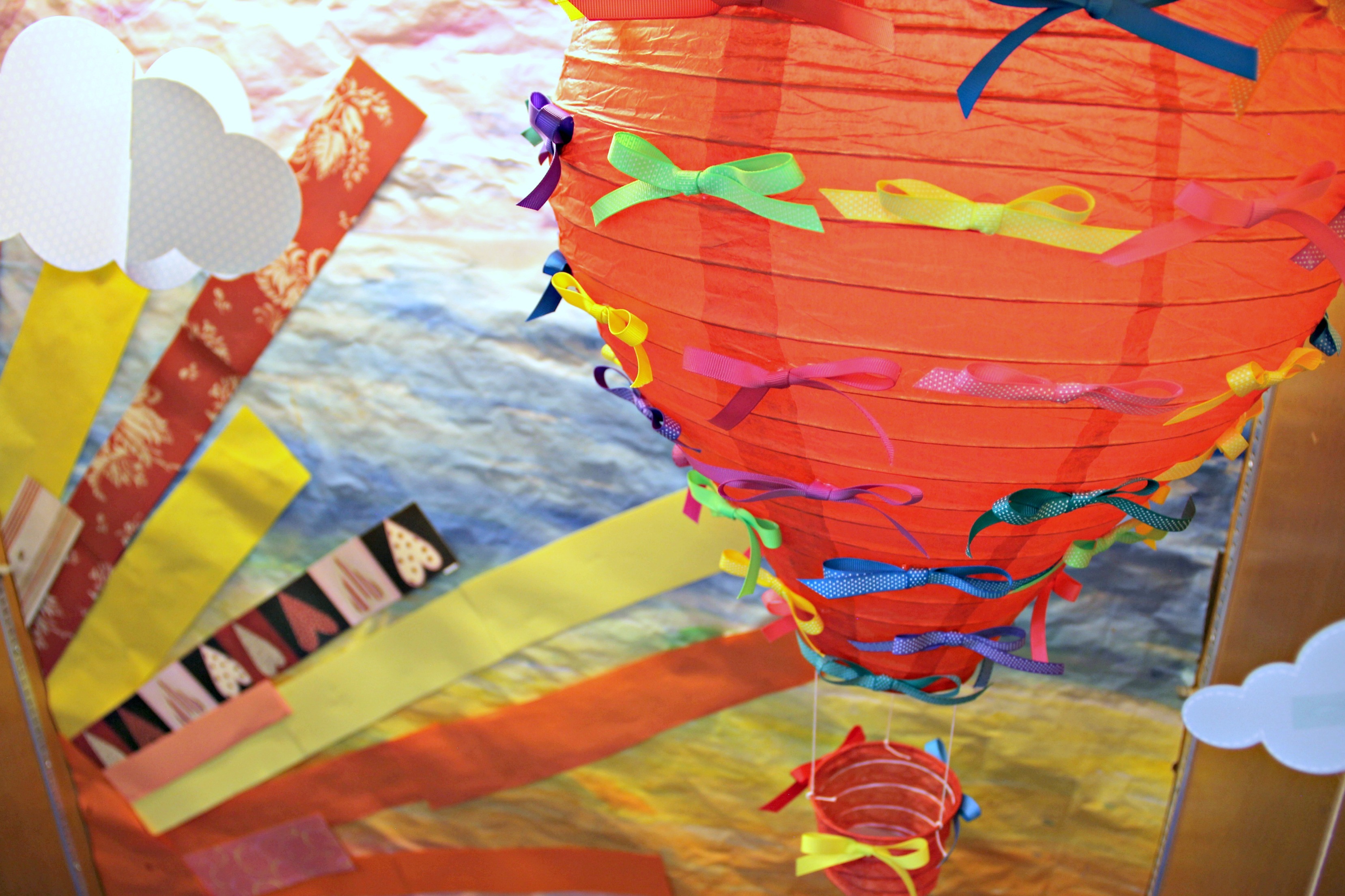 Decorate your hot air balloon lanterns with a variety of Oriental Trading products!