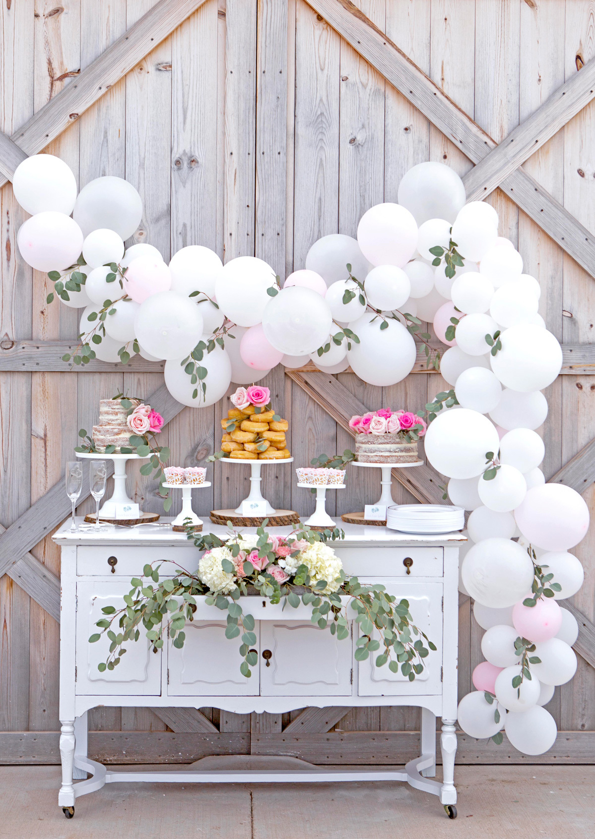 rustic wedding cake and dessert table