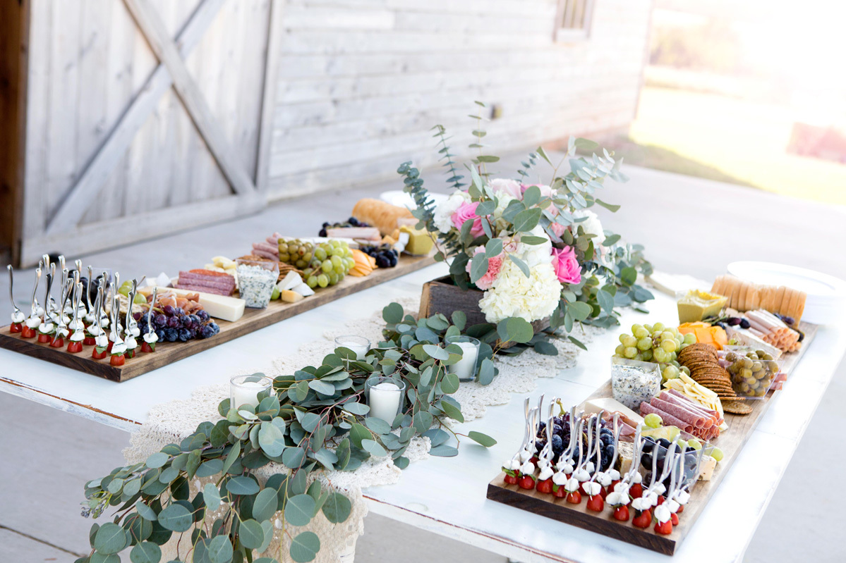 Wedding Charcuterie board ideas and rustic eucalyptus garland