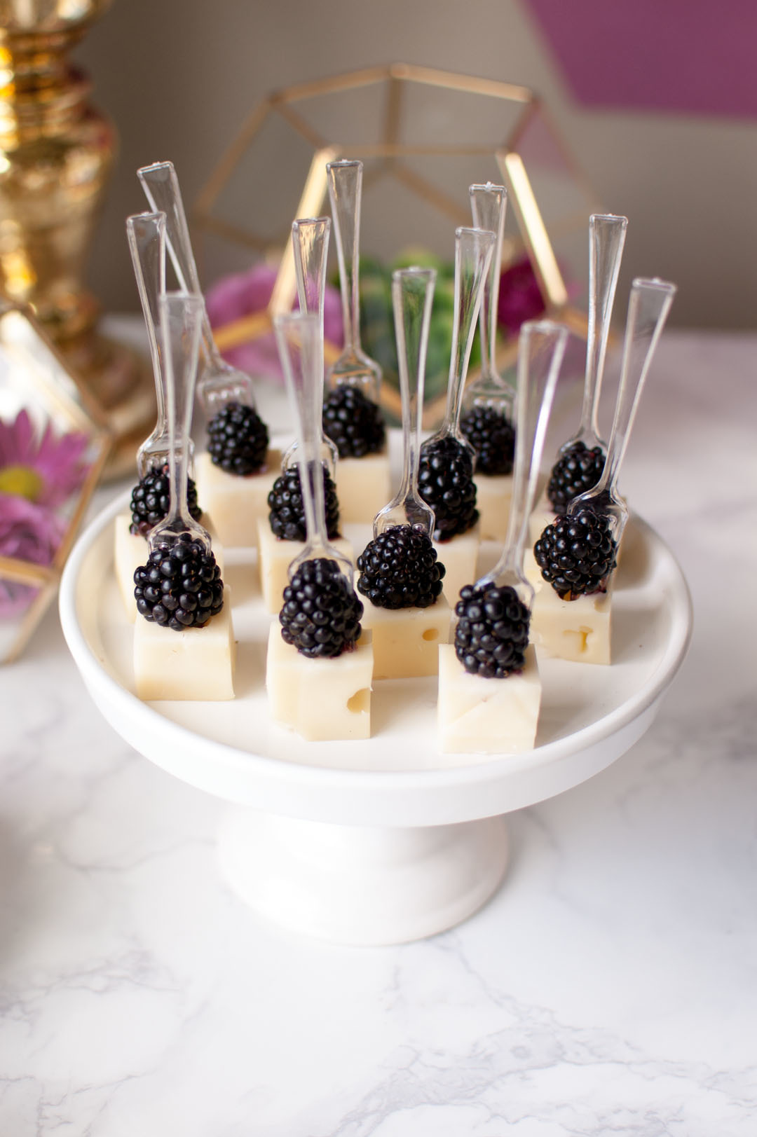 Looking for a chic Bridal Shower Theme? Check out our Purple Geometric Terrarium Bridal Shower with the help of Oriental Trading.