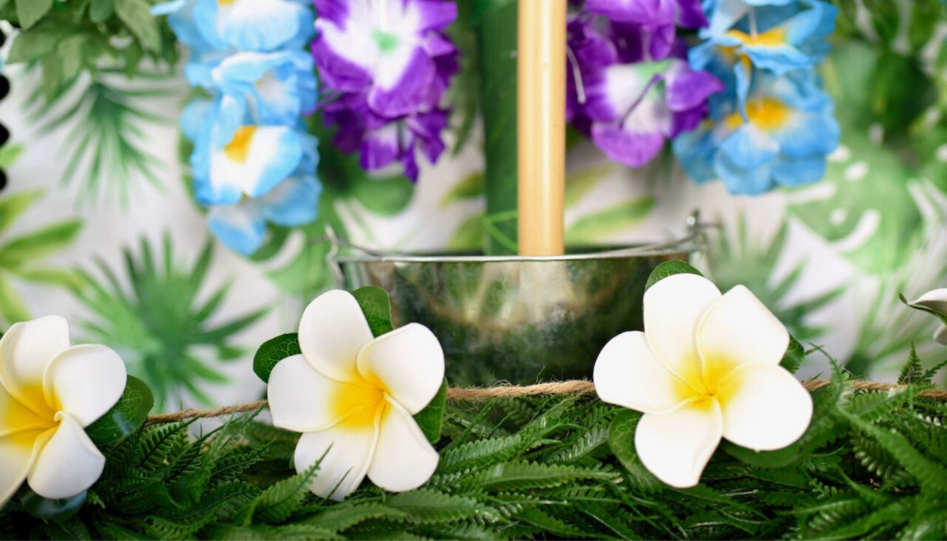 Beautiful setting for a Celebration of Life with a beach theme featuring  blue and yellow in the flowers and t…