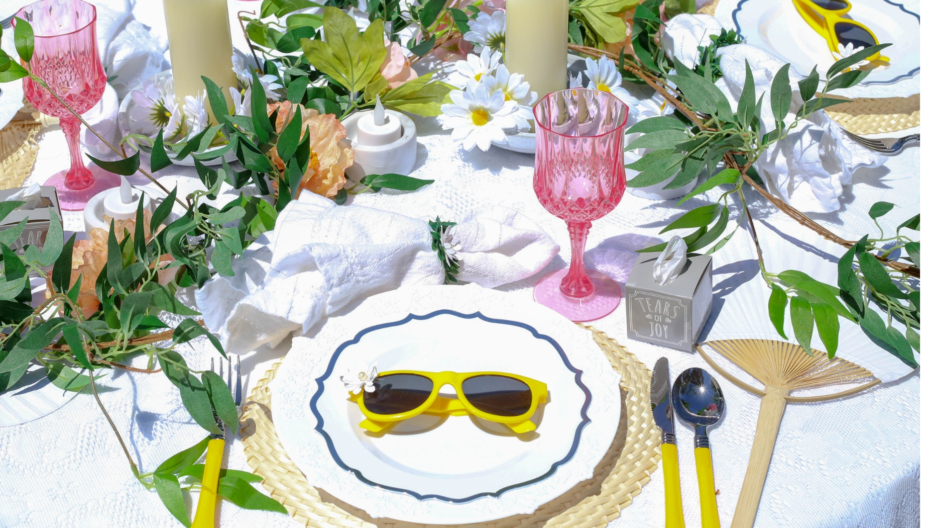 daisy wedding place setting place settings for a boho daisy themed wedding include cute yellow sunglasses and tiny wedding kleenex boxes