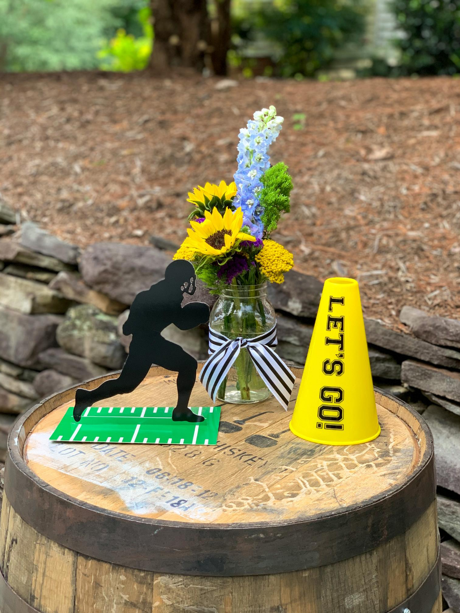 Just because live games may not be happening right now doesn't mean we can't still have a little football fun! Create a tailgate celebration in your own driveway with your closest friends or family!