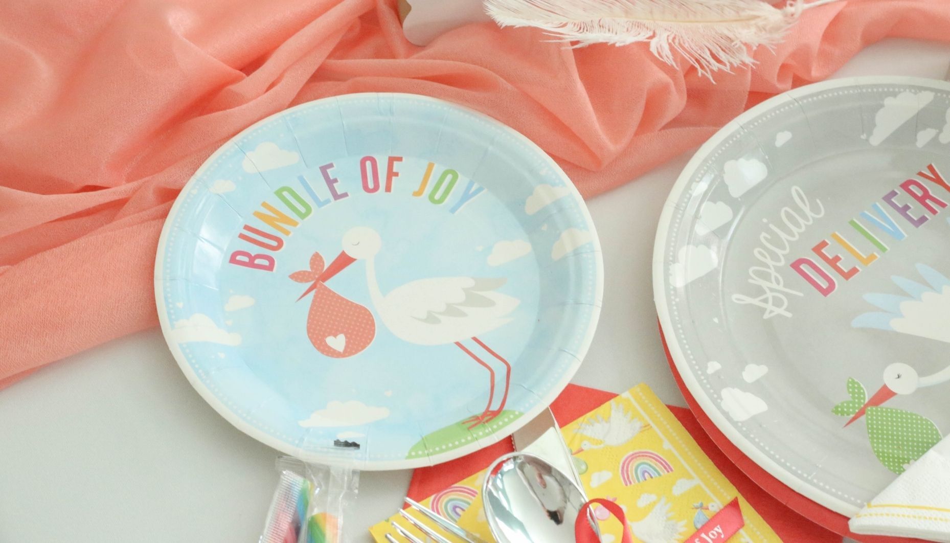 Stork themed baby shower dessert plates in light blue.