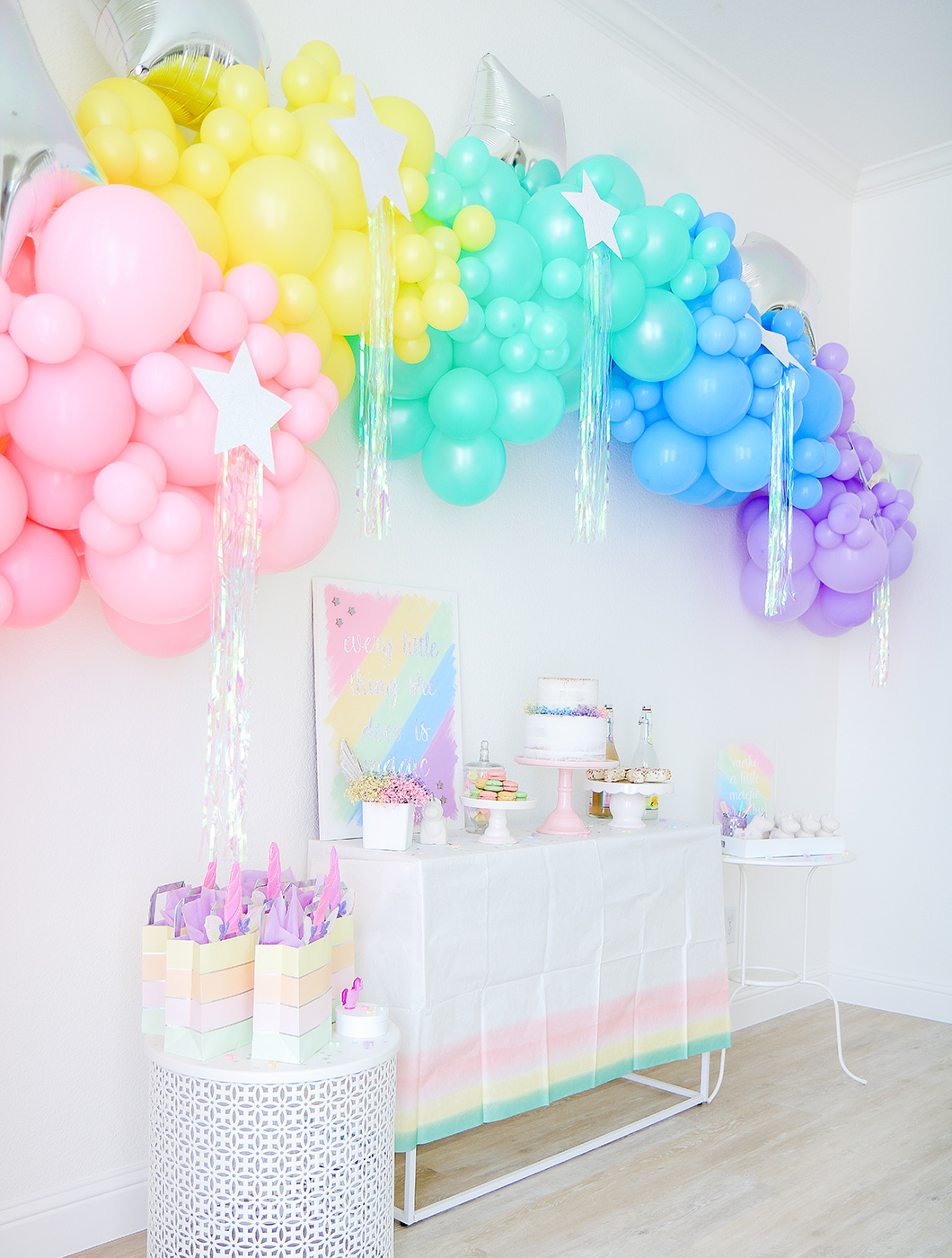 rainbow unicorn sip & see dessert table