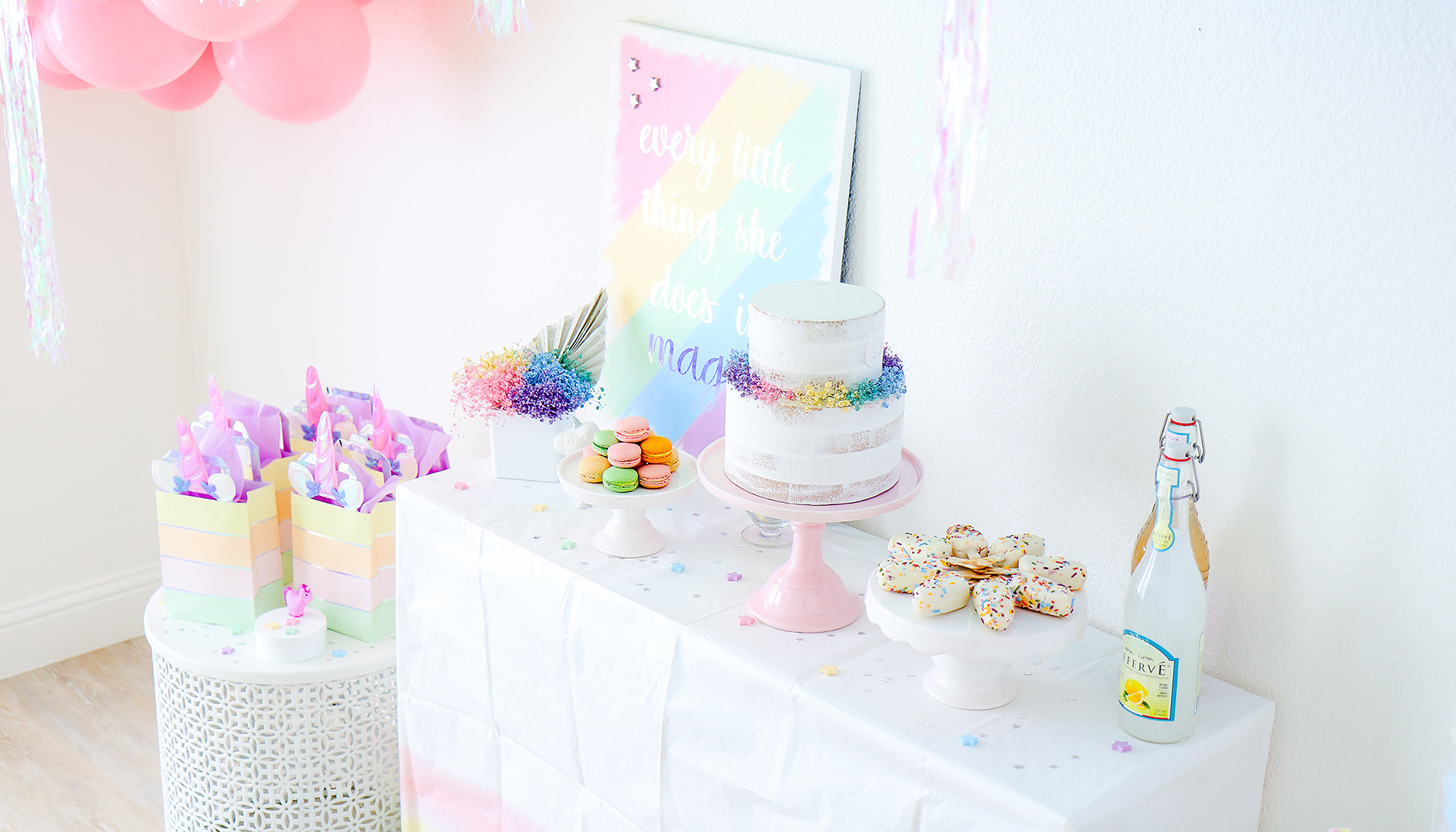 rainbow unicorn sip & see dessert table