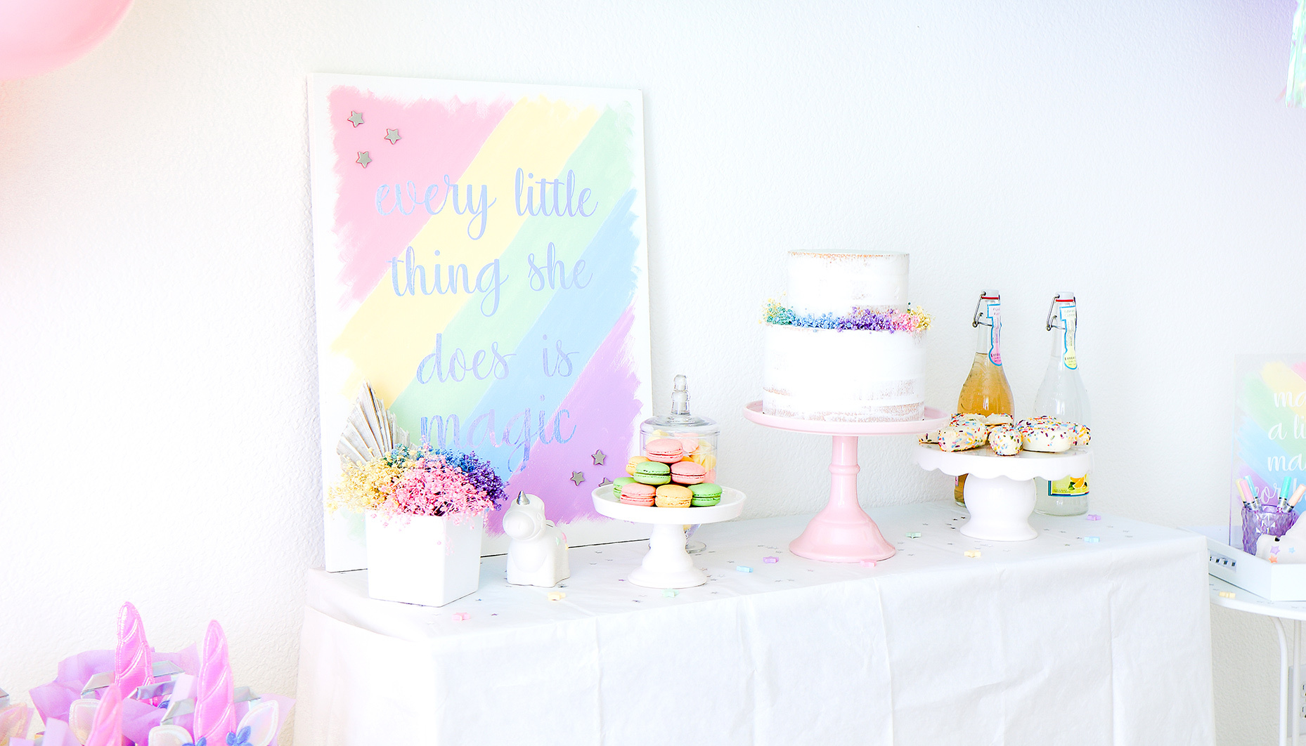 rainbow unicorn sip & see dessert table