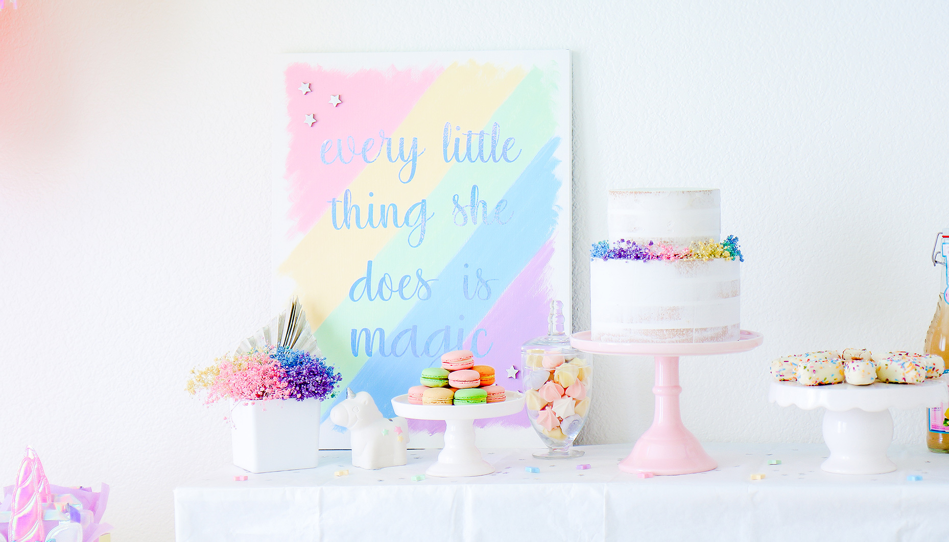 rainbow unicorn sip & see dessert table