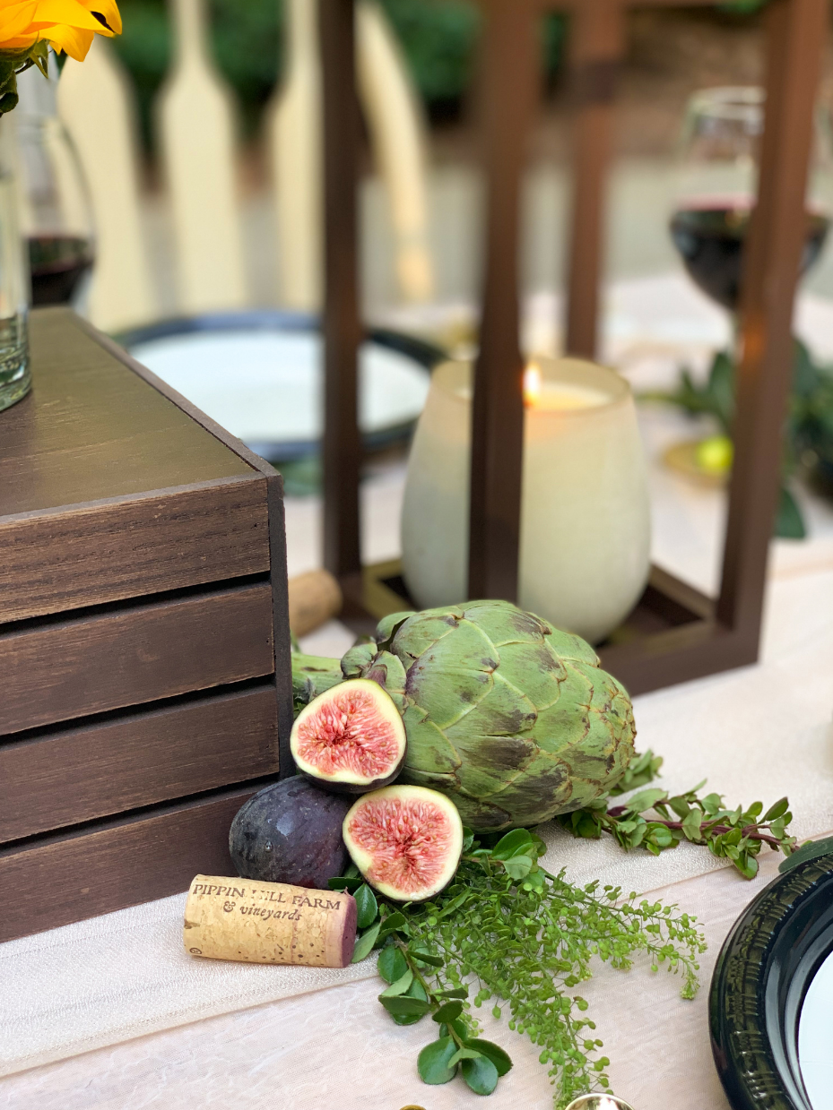 Fresh figs, herbs and artichokes create stunning decor elements for an Italian Bridal Shower.