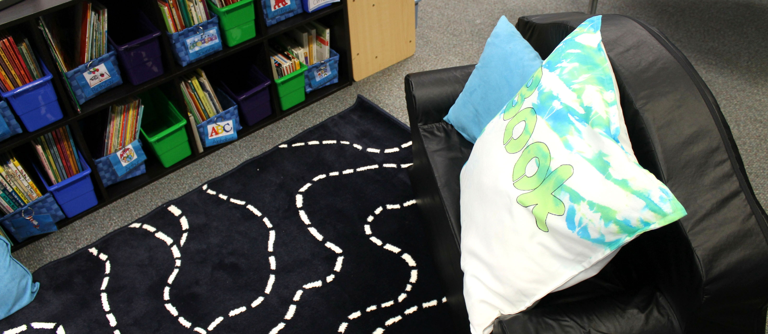 "Read All About" Turquoise and Black Classroom Library Makeover