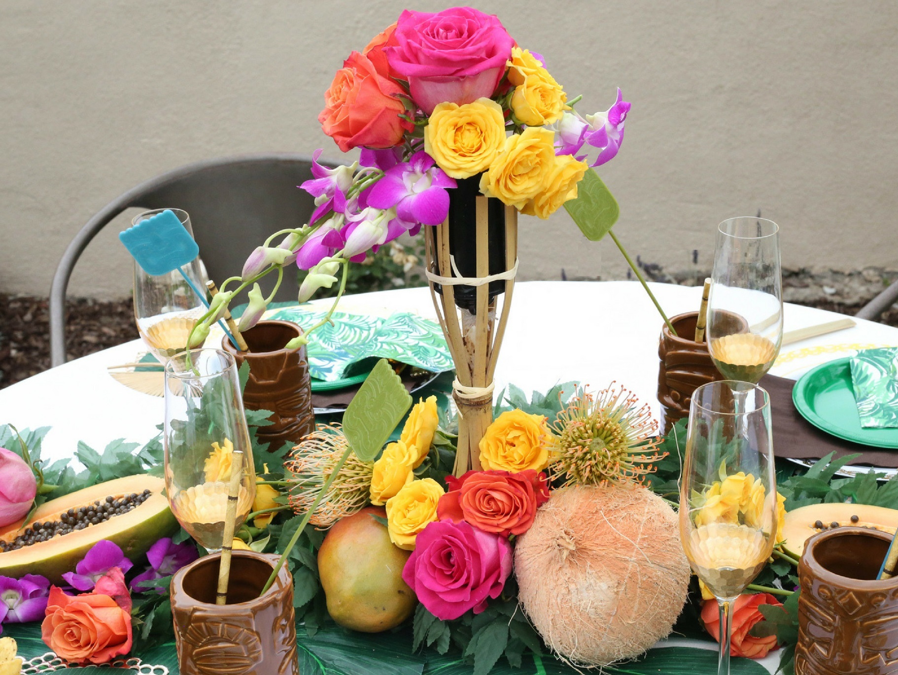 Tiki Torch Floral Wedding Centerpiece