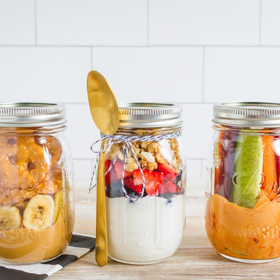 Healthy Snacks in glass jars Stock Photo by ©Rosinka79 61933605