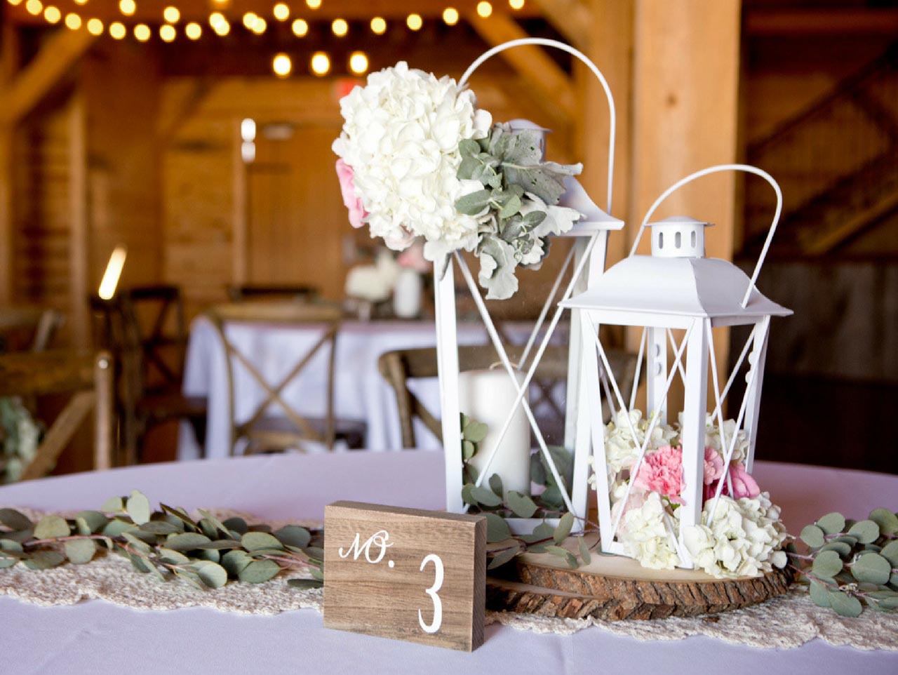 DIY Rustic Centerpiece with Rose Buds and Wood Round