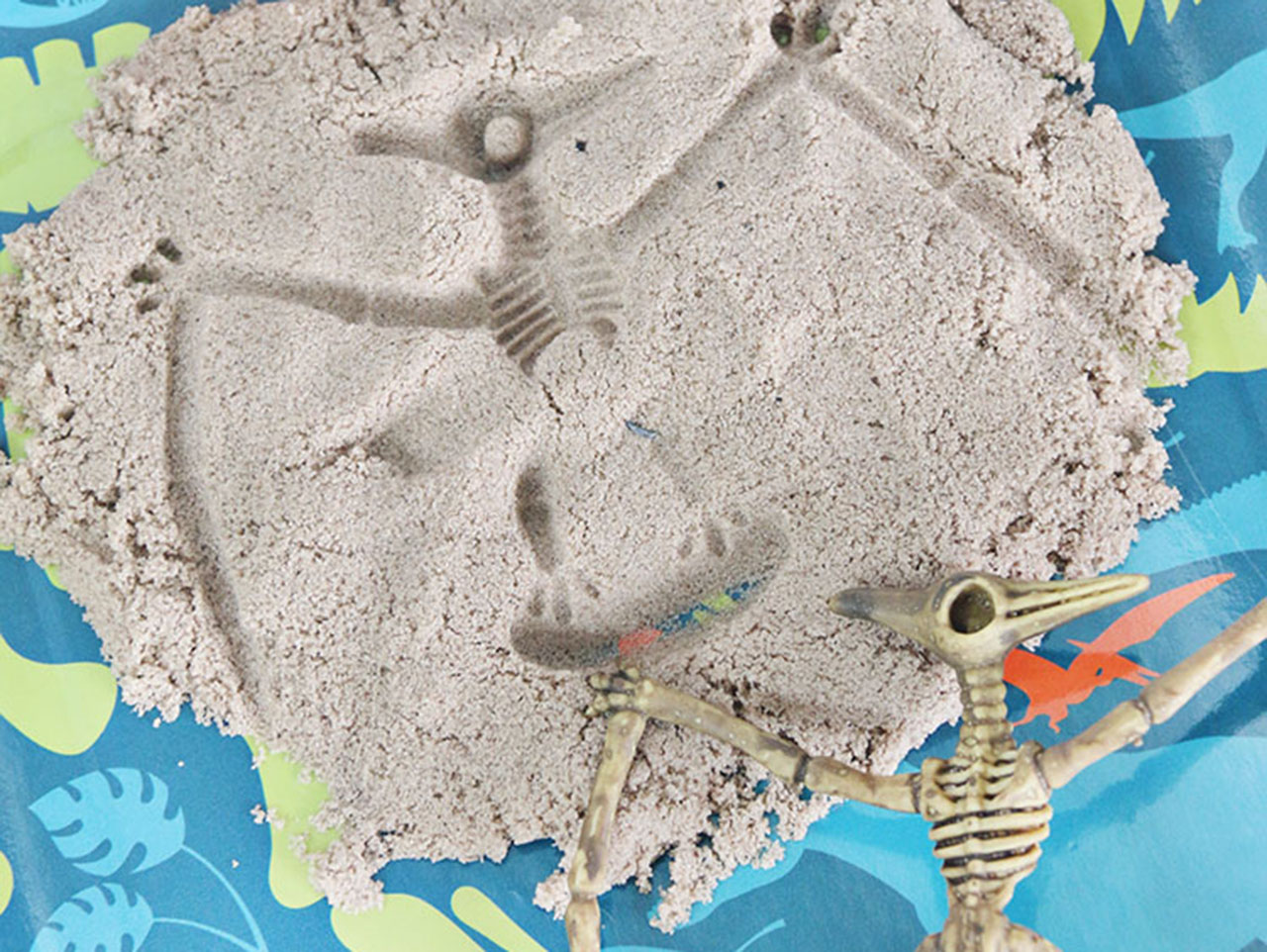 Dino Dig Fossil Kinetic Sand Sensory Bin 